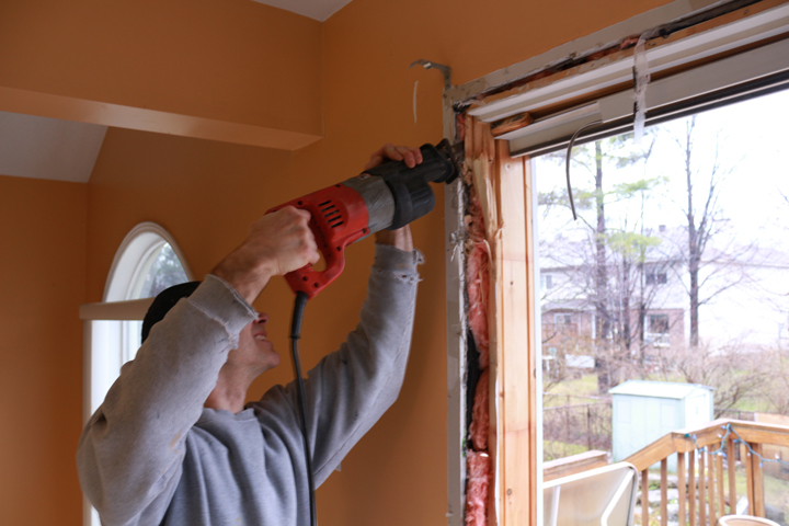 Cutting screws securing old door jam